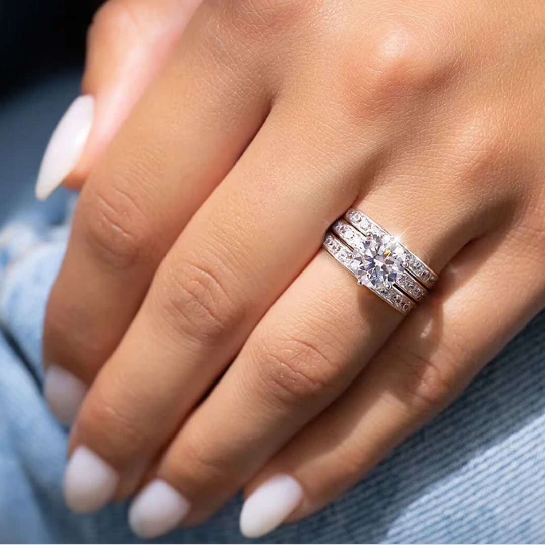 Round moissanite engagement ring set with double pavé wedding bands