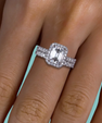 Emerald cut moissanite halo bridal set with sparkling centre stone