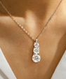 Shop the Nova Necklace, a 1.8ct moissanite gold-filled three-stone necklace with brilliant diamond-like sparkle. Perfect for everyday wear, layering, or gifting.