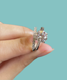 Sparkling moissanite engagement ring and matching band