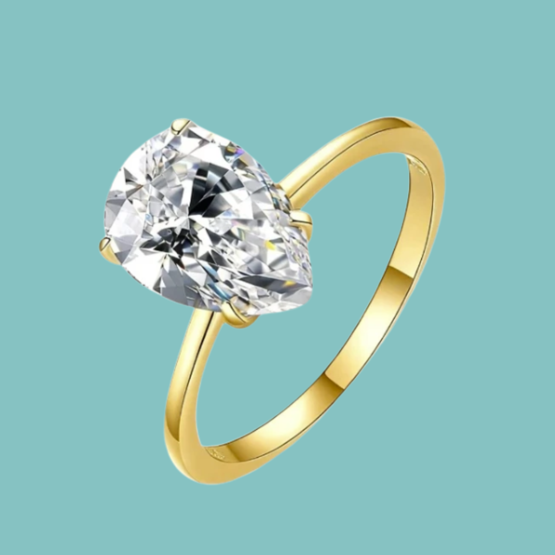 Dainty pear cut moissanite solitaire ring with sparkling 1 carat stone