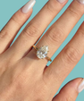 Elegant 1 carat pear shaped moissanite engagement style ring in 14k gold filled setting
