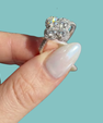 Amara 14k gold-filled ring with a floral-inspired sparkling cluster and stone-set band.