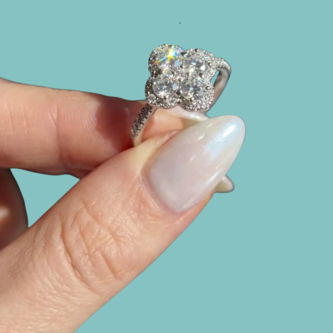 Amara 14k gold-filled ring with a floral-inspired sparkling cluster and stone-set band.