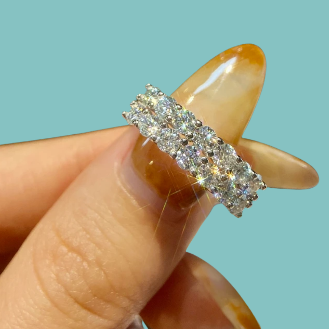 Celina Band with rows of round sparkling stones in an elegant wide band design.