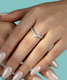 Moissanite contour wedding band in a V-shaped design, perfect for pairing with an engagement ring.