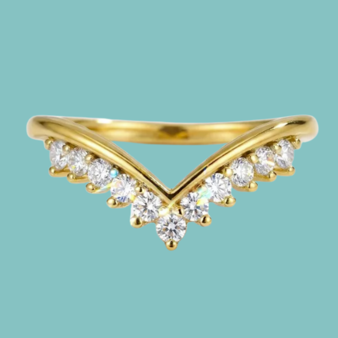 Vela wedding band featuring a delicate chevron design with moissanite sparkle.
