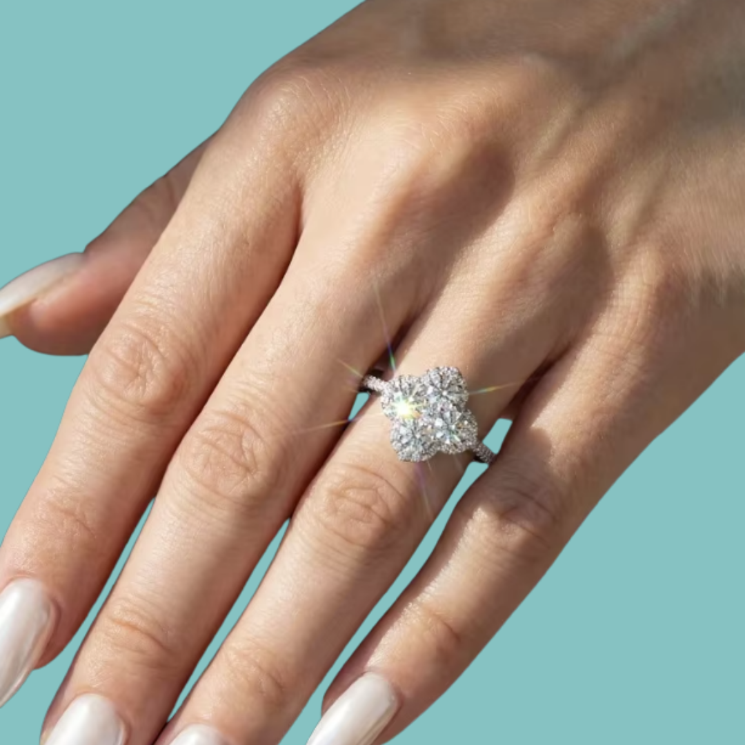 Amara 14k gold-filled ring with a floral-inspired sparkling cluster and stone-set band.
