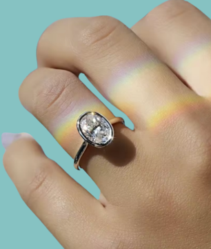 Solara Bezel Set Oval Moissanite Ring
