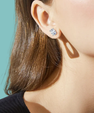 Oval solitaire moissanite stud earrings with brilliant sparkle