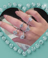Oval cut moissanite engagement ring with accent stones