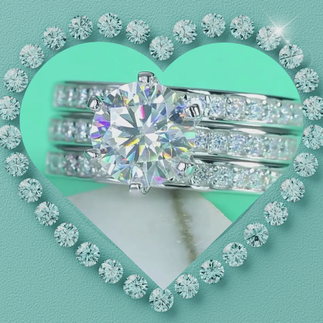 Round cut moissanite bridal ring set with matching pavé bands in sterling silver