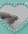 Luxury moissanite halo ring with cushion frame and pavé details