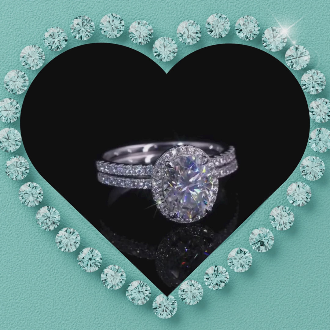 Oval cut moissanite halo engagement ring set with matching band