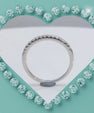 Half eternity moissanite sterling silver wedding band 