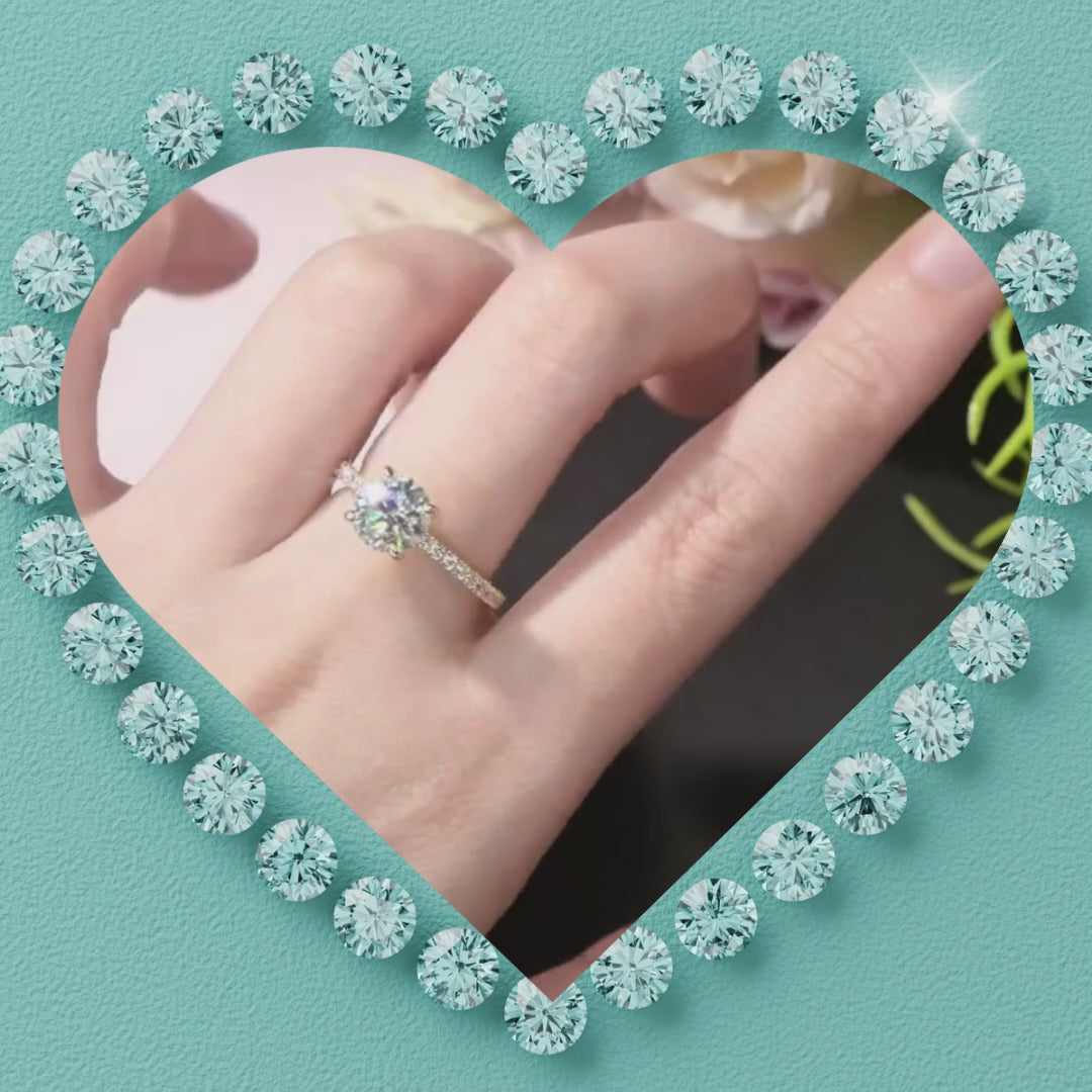 Elegant hidden halo moissanite ring featuring a 1 carat round brilliant stone and pavé band in 14K gold filled.