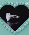Classic solitaire ring with pear cut moissanite