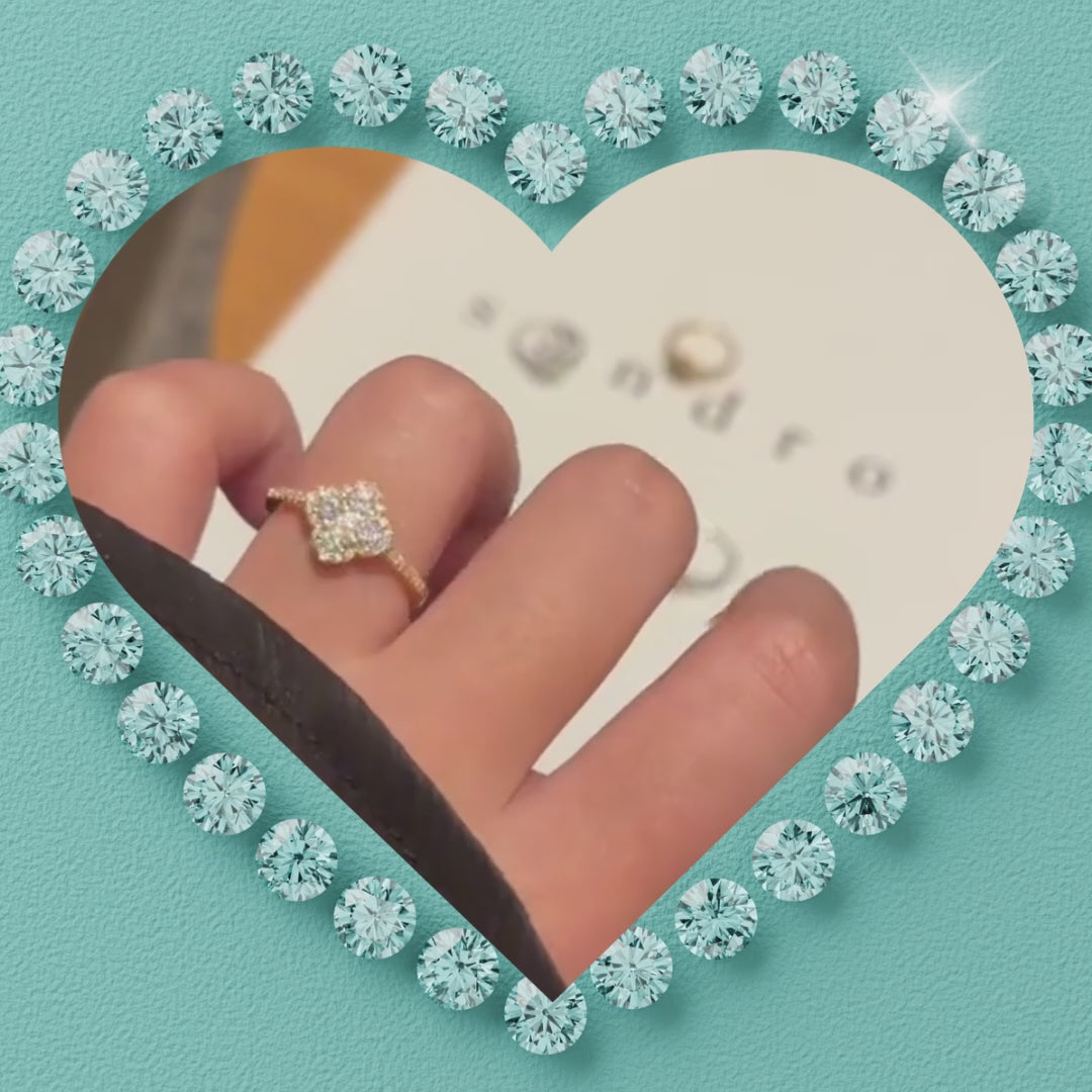 Amara 14k gold-filled ring with a floral-inspired sparkling cluster and stone-set band.