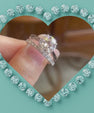 Sterling silver round moissanite engagement ring set with matching band