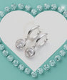 Elegant bezel set drop earrings with sparkling moissanite stones