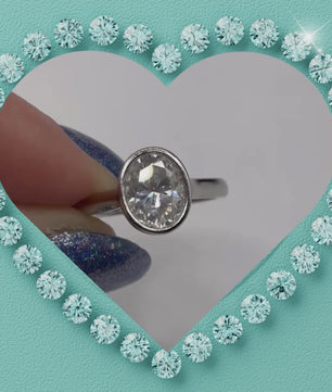 Solara Bezel Set Oval Moissanite Ring