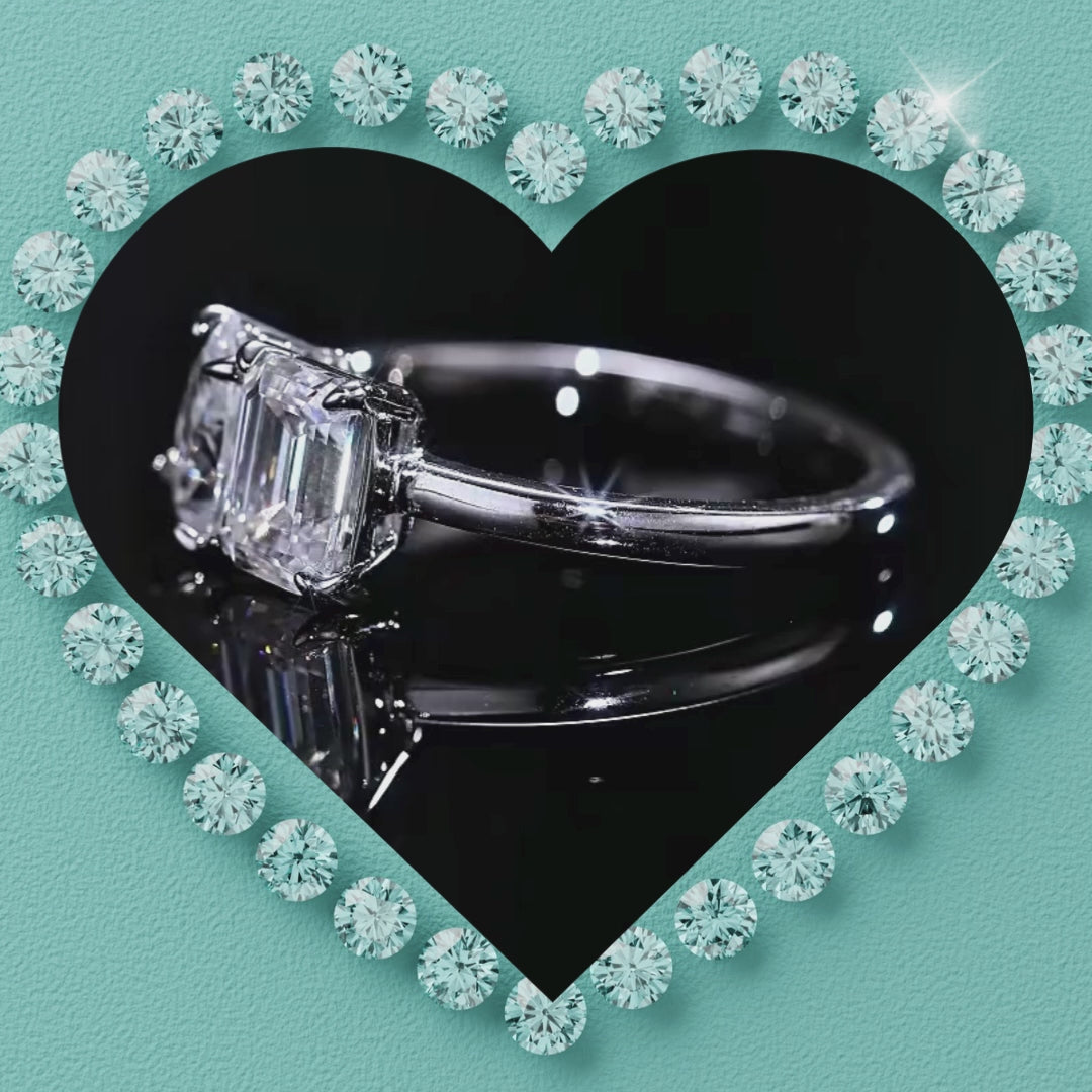 2 Stone emerald and Pear cut ring