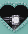 Emerald cut moissanite ring with simple elegant design