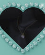 Round moissanite necklace set with matching stud earrings in silver