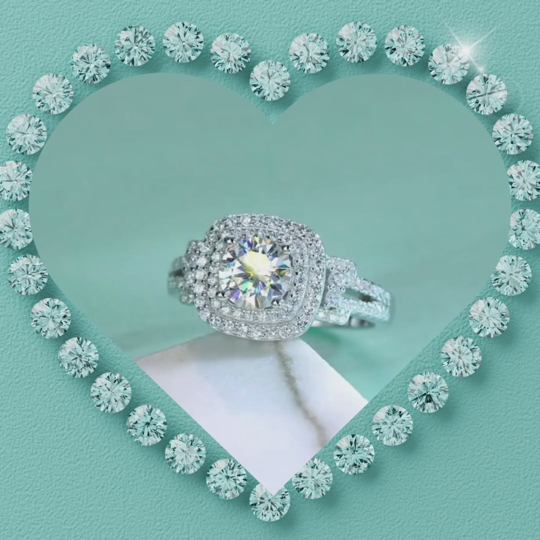 Heartline Halo Ring with a round brilliant centre stone, double halo setting and pavé band in white gold