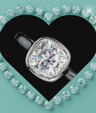 The Astra Bezel Set Moissanite Ring